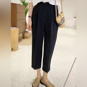 Black straight pants with folded hem